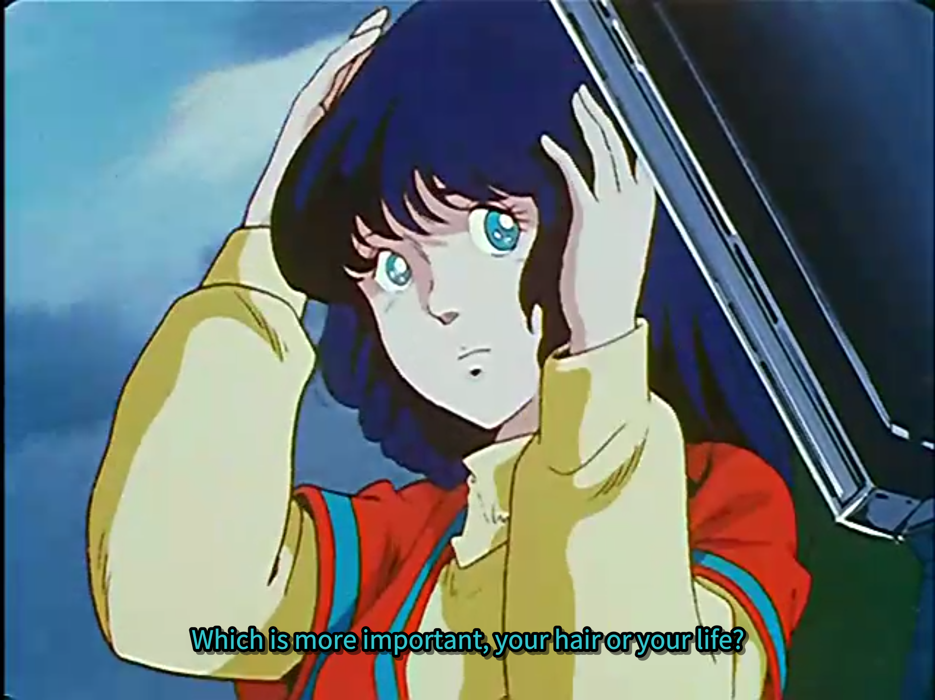 Minmay listens while Hikaru says from off-screen, "Which is more important, your hair or your life?"
