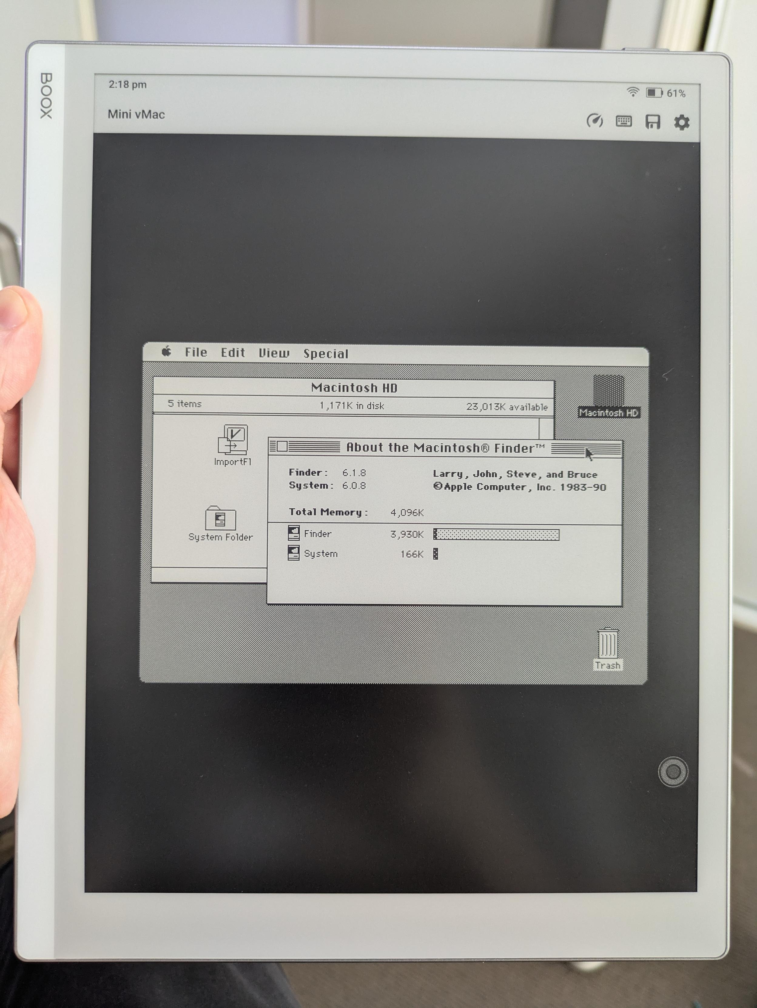 The mini vMac Android port running on a BOOX Go 10.3 B&W e-Ink tablet. The emulator is booted into System 6.0.8. There's a Macintosh HD Finder window open. On top of that is a "About the Macintosh® Finder™" window.