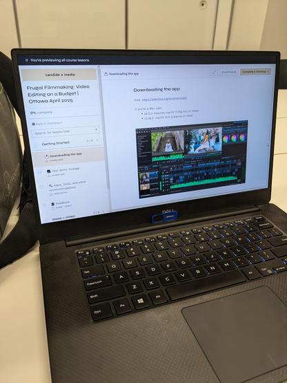 Photo of an open laptop showing the online workshop portal that participants can consult between workshops to review what they've learned.