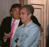 a man in a denim shirt is standing next to a man in a pink tie