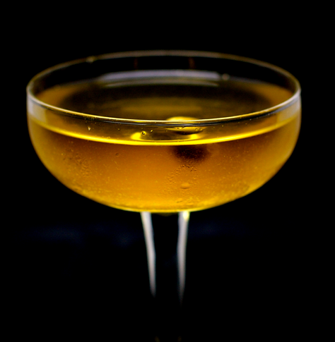 The cocktail itself in a chilled coupe