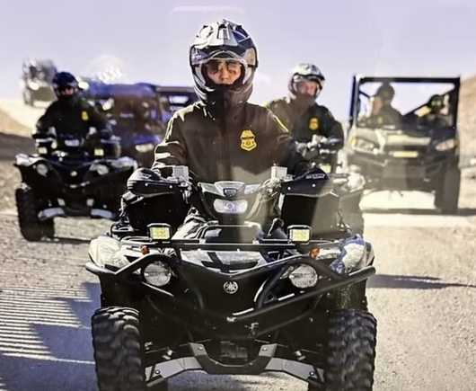 Kristi Noem  in full gear on a quad bike being followed by a formation of similar for yet another absurd self-promoting photo opportunities.