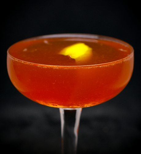 The cocktail itself in a chilled coupe and garnish with a lemon twist