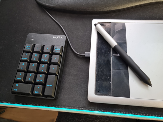 A numpad next to a graphic tablet