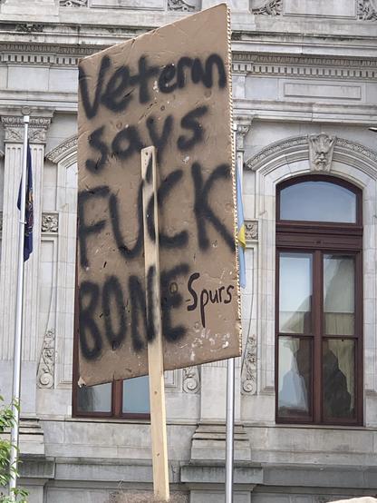 Philly May Day rally signs: “Veteran says fuck off bone-spurs”