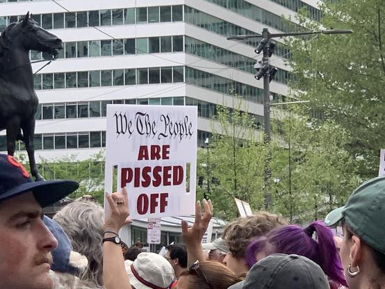 Philly May Day rally signs: We the People are Pissed Off