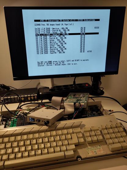 The SWITCHER.TOS application that lets you switch between several ROM images and upload new ones, running on the Atari STE.