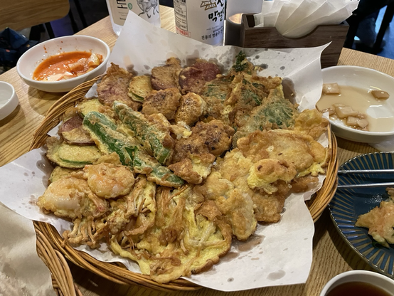 Assorted Jeon, which includes meatballs, salami, and zucchini