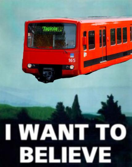 Länsimetro-meemi, jossa teksti I want to believe ja Tapiola-tekstinen metro lentää taivaalla metsämaiseman yläpuolella.