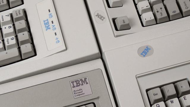 A photo showing different "IBM" logos from various Model F and Model M keyboards of various ages