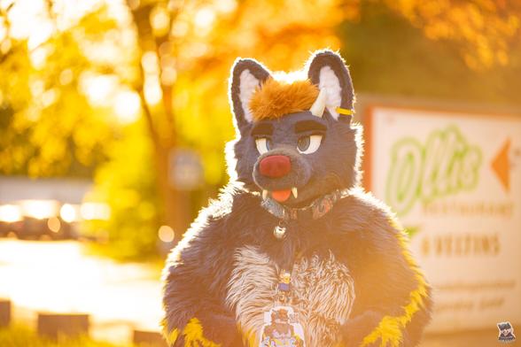 Me in suit surrounded by a yellow orange glow.