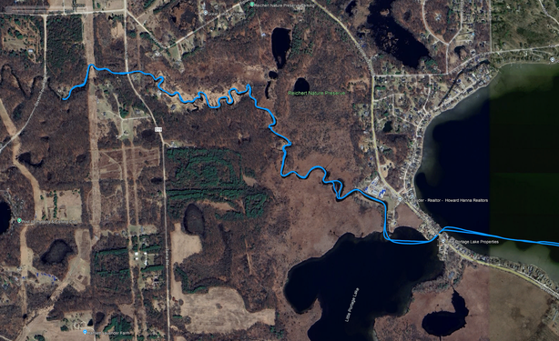 Aerial view with a blue line tracking part of the route.