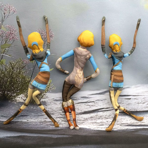 view of the dolls from behind doing some sort of human sacrifice dance, their limbs distorting with demonic energy
