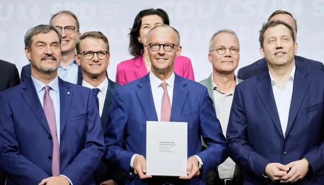 Signature de l'accord de coalition au pouvoir en Allemagne