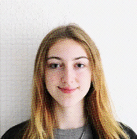 A profile picture of a young female, smiling.