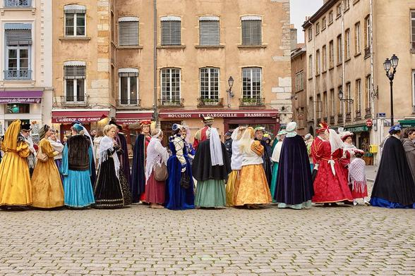 Medieval festival Les Penons de Lyon with citizens in medieval clothing in Lyon, France