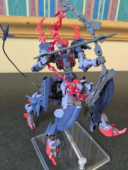 HG Barbataurus raised on a stand with an arrow drawn on its bow