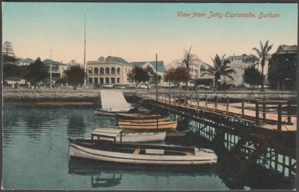 Printed colour postcard showing a view from the Jetty Esplanade at Durban in Natal, South Africa.

Published by A. Rittenberg, Durban, not numbered, c.1910.

Postally unused.

Very good condition, with very slight corner bumps.