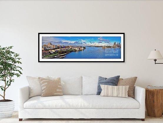 Four of my photographs stitched together to form a panorama of our beautiful Sydney Harbour taken from the walkway across the Sydney Harbour Bridge at the northern end looking east.
Angles of images taken from the Harbour Bridge walkway are a little limited due to the side construction of the bridge and the tall safety fence.

By Kaye Menner Photography.

On the left of the image is the suburb of Kirribilli showing many highly priced home units right on the waterfront. At the back right of the image is the Sydney Opera House and Circular Quay just a little further to the right.

There is always some form of traffic on the water in Sydney Harbour, from small yachts to ferries, tankers, ships and speed boats.

THE FINE ART AMERICA LOGO WILL NOT APPEAR ON PURCHASED PRINTS OR PRODUCTS.