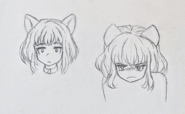 A pair of pencil sketches of the head of a catgirl with shoulder-length hair. In the first one she has a mildly interested or surprised expression. In the second one she looks rather angry, with her cat ears folding back against her head.