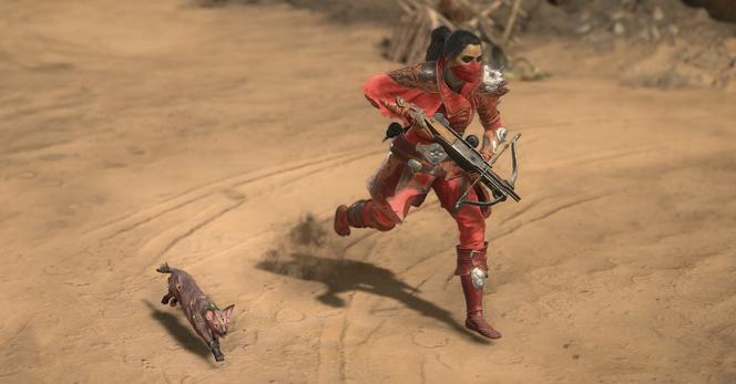 A Diablo 4 player character rogue holding a crossbow and sprinting in a desert alongside a demonic cat pet