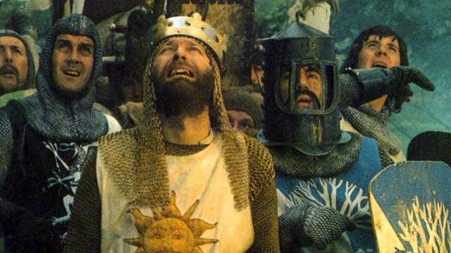 king arthur's and his knights staring up at something.