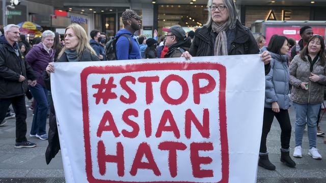 Asian Americans are gathered at the Times Square to protest Asian-Hate in New York City. 