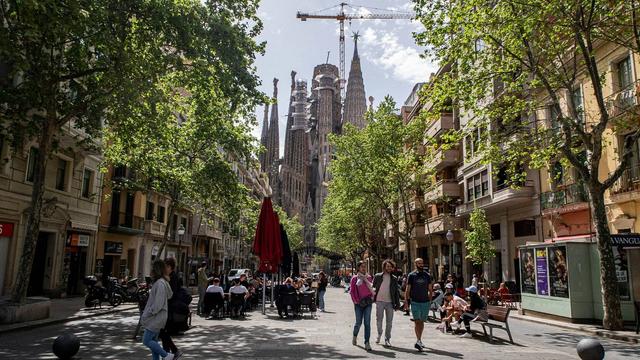 A street in Barcelona with the Sagrada Familia in the background. | Copyright Denise Jans/Unsplash