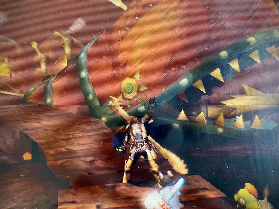 Hunter waving in front of the Arluq in Harth