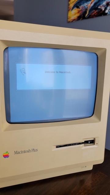 Picture of the "Welcome to Macintosh" message displayed during the first good boot of the Mac Plus.