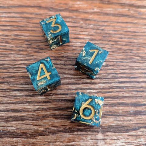 Beautiful green and gold dice handmade by Dice Extractions for the Downcrawl campaign.