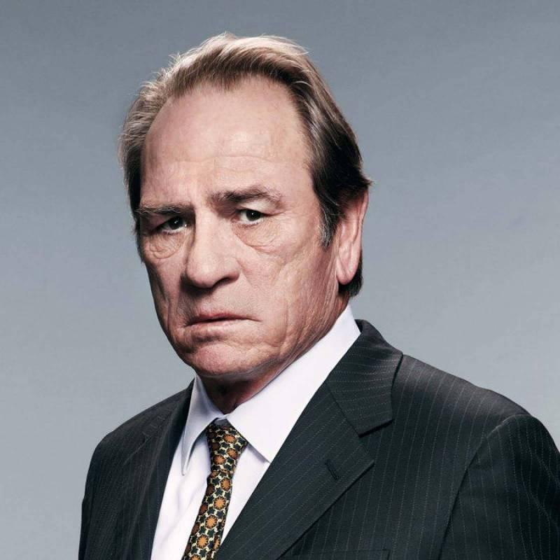 The photo reference of Tommy Lee Jones used for the sketch.
