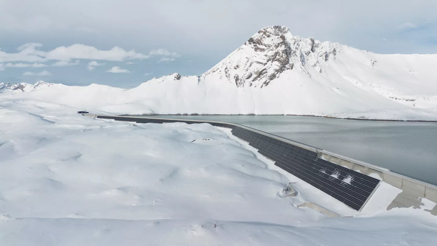 The Mutsee dam is long rather than tall, and curves only for a fraction of its length.

"A view shows the solar panels of AlpinSolar power plant of Swiss Axpo energy company, on the dam of Lake Muttsee, near Linthal, Switzerland, January 23, 2023. REUTERS/Arnd Wiegmann"