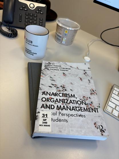 The book “Anarchism, Organization and Management” on my desk.