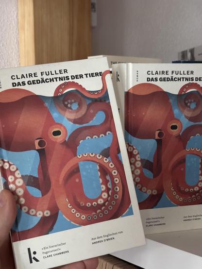 The same book twice with a cook octopus on the front. It’s in German “The Memory of Animals” by Claire Fulle