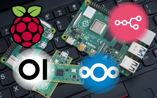 Na zdjęciu widać kilka płytek komputerowych Raspberry Pi leżących na klawiaturze laptopa. Na pierwszym planie nałożone są cztery logotypy: maliny (symbol Raspberry Pi), różowego znaku n8n (narzędzie do automatyzacji), niebieskiego loga Nextcloud (chmura prywatna) oraz czarno-białego loga Ollama (narzędzie do lokalnych modeli AI). Obrazek symbolizuje wykorzystanie Raspberry Pi jako platformy dla nowoczesnych, lokalnych rozwiązań chmurowych i sztucznej inteligencji.