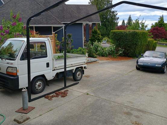 A Honda Acty Dump on the left, my Miata on the right.