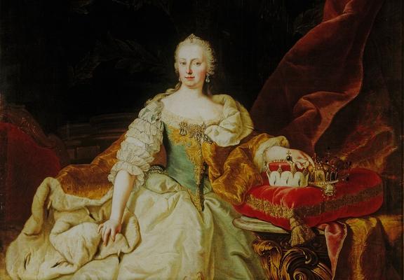 Maria Theresa Habsburg with her various crowns. She is a white woman with pale hair, dressed in silks and velvet.