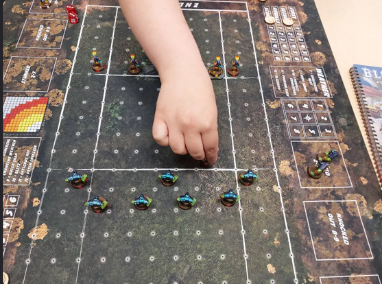 The hand that will only roll perfect results, moving an elf too close to my orcs. Bullshit. Take that girl to the casino I say.