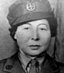 Vera Leigh in uniform. She is a white woman with dark hair.