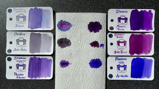 Cult Pens May Ink Sub Box swatches + paper towel faux-chromatography. Dominant Industry × Cult Dawn, ColorVerse Anti-Matter, Diamine Forever Passion Flower, Diamine Majestic Purple, Octopus Fluids Violet Parrot, Pennonia × Cult Árvácska