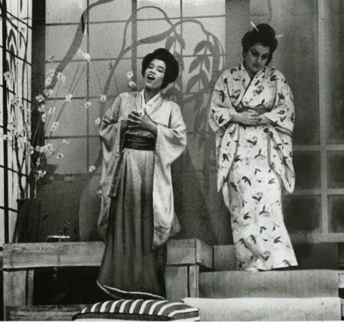 Camilla Williams as Cio-Cio San in Madame Butterfly, along with another singer. Both are dressed in kimonos.