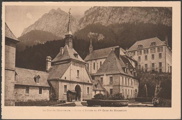 Printed sepia postcard showing a view of the entrance of the heart of the monastery of the Grande Chartreuse in Isère, France.

Published by Martinotto Frères, Grenoble, No 89, c.1920s.

Postally unused.

Good condition, with very slight corner bumps, but very slight knock to top edge.