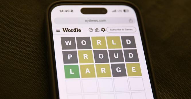 Wordle Game On Phone Photo Illustrations