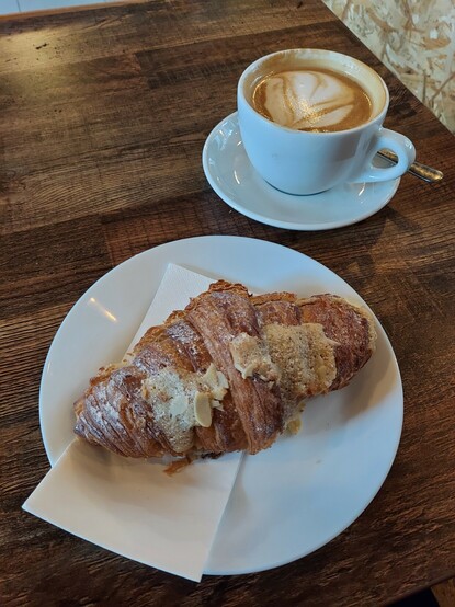Almond croissant and cappuccino, yum! 