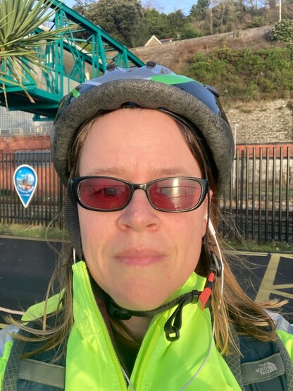 Selfie of rider with hi vis and sunglasses