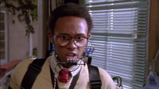 Image of Stevie from Malcolm in the Middle using cybernetic enhancements to beat up Reese