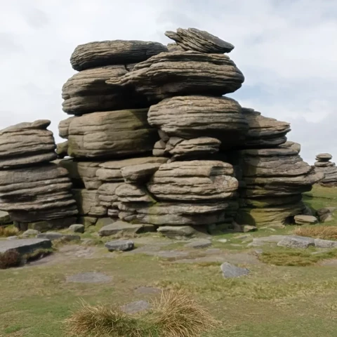 A photo of a mound of boulders, taken on a walk in the Peak District. The boulders are cartoon like in their roundness, and look a bit silly to my eye, which is why they stuck in my mind as a possible home for my monsters.
