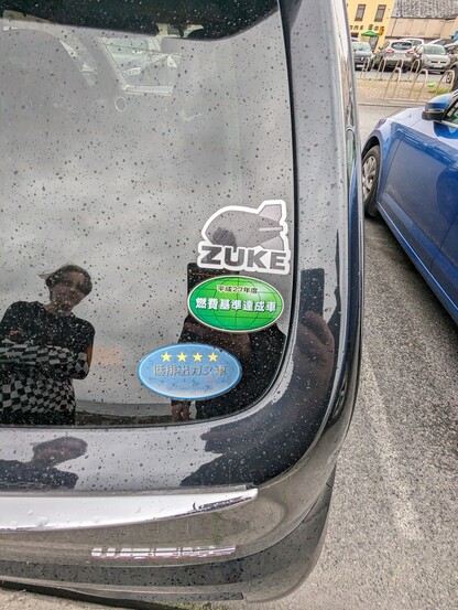 Japanese certification stickers on the rear window 