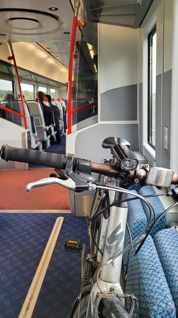 My silver Specialized Sirrus bicycle strapped in for the ride on the train between Moira and Lisburn.